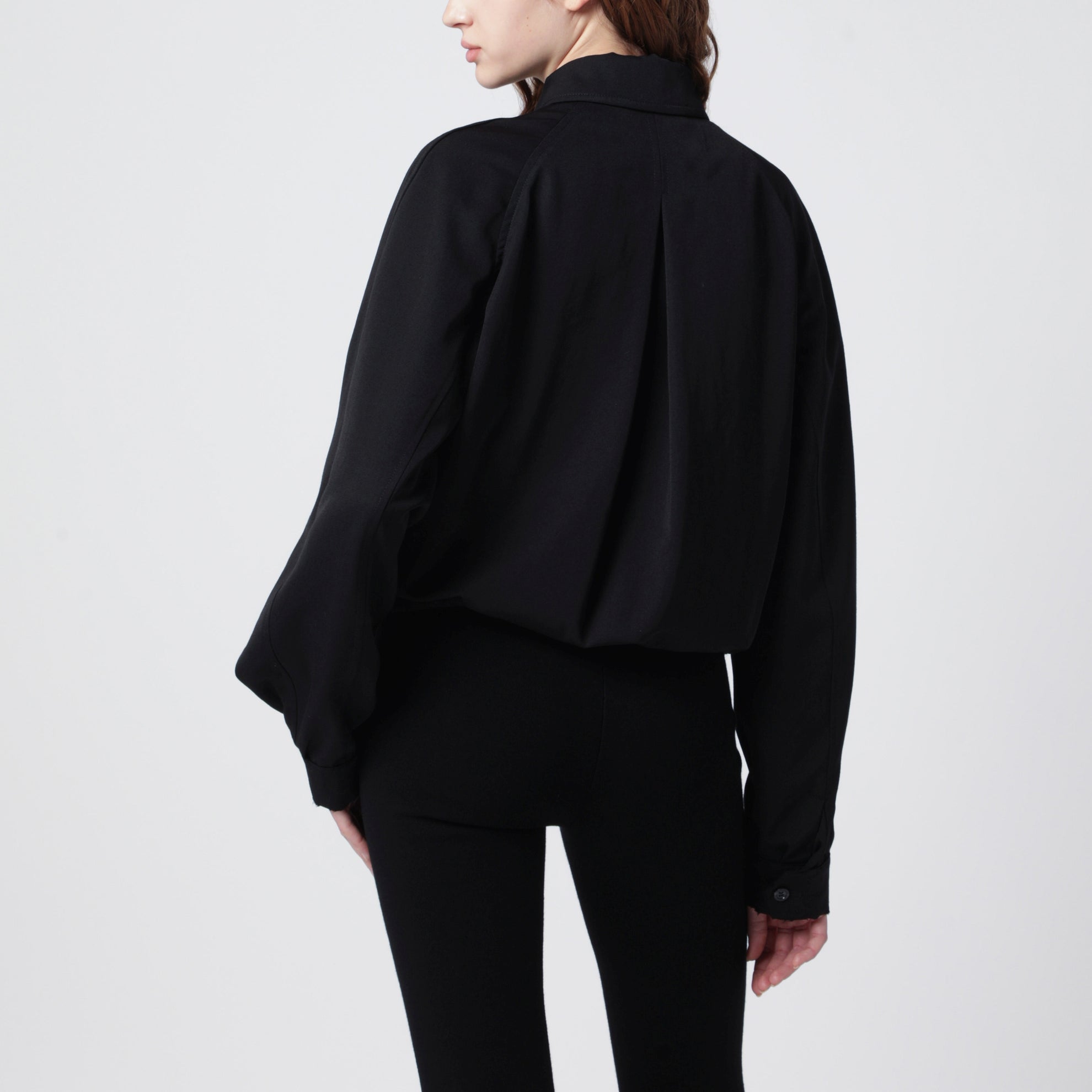 Black zip-up jacket in virgin wool