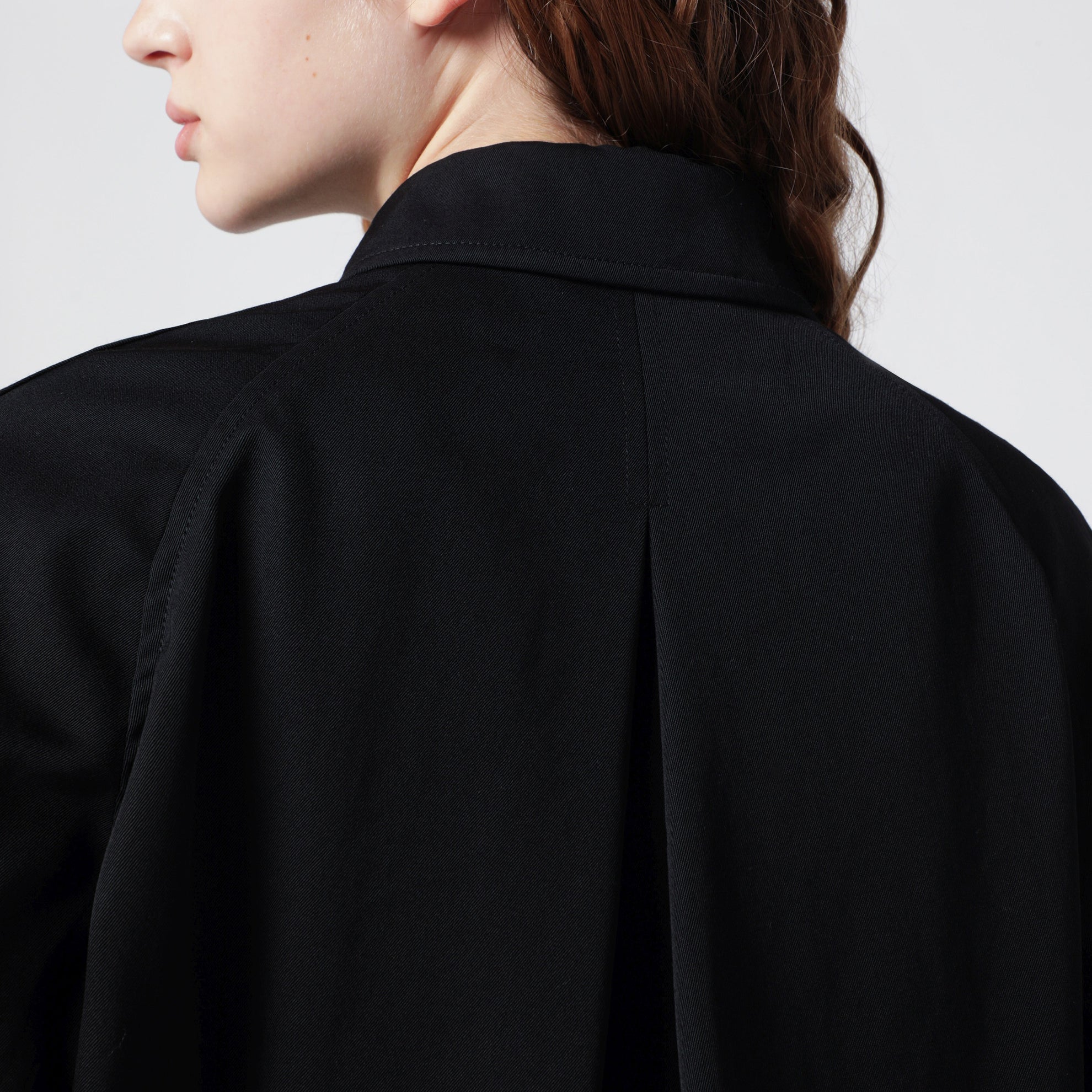 Black zip-up jacket in virgin wool