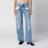 Jeans blu chiaro slavato con tasche con inserto a contrasto
