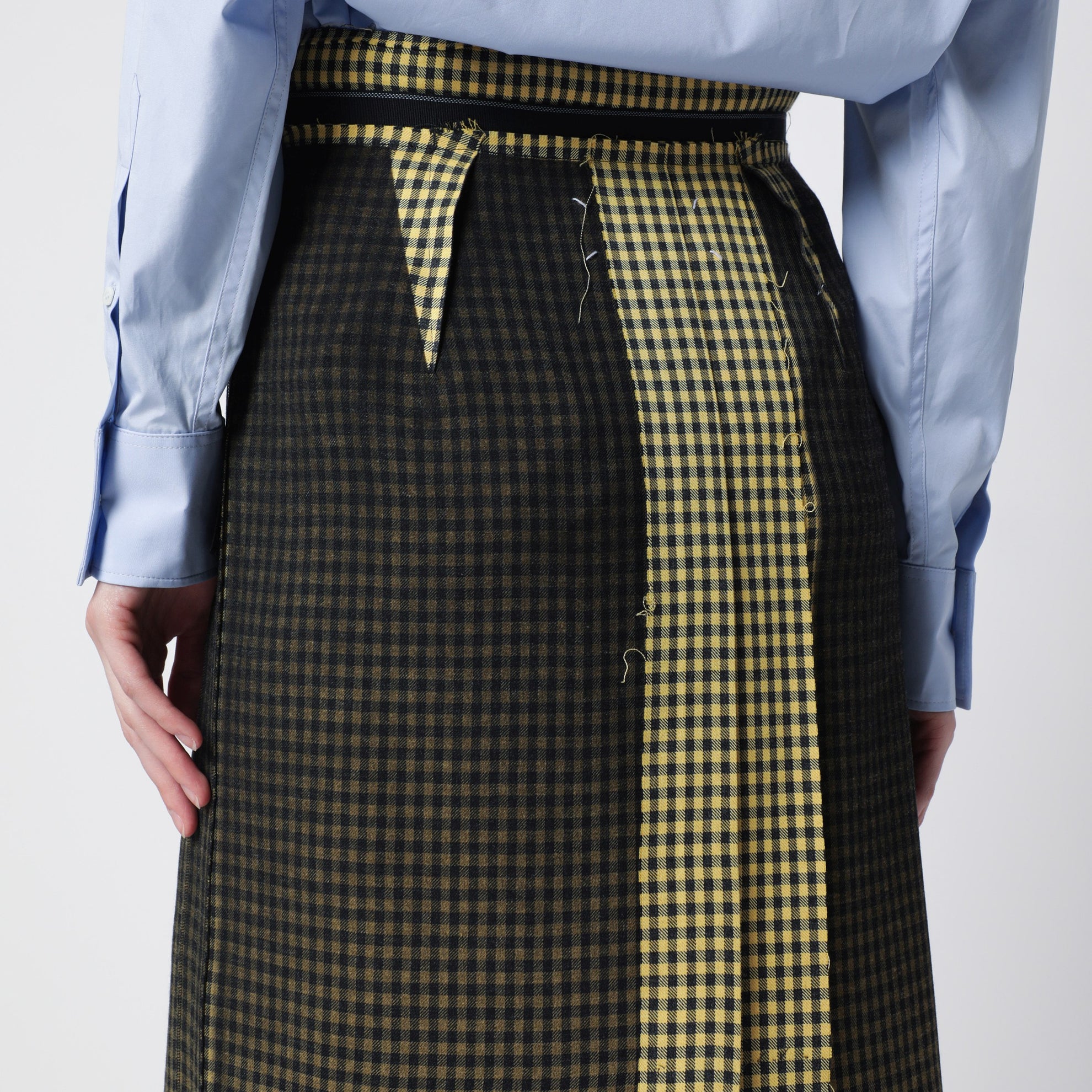 Virgin wool midi skirt with faded check pattern