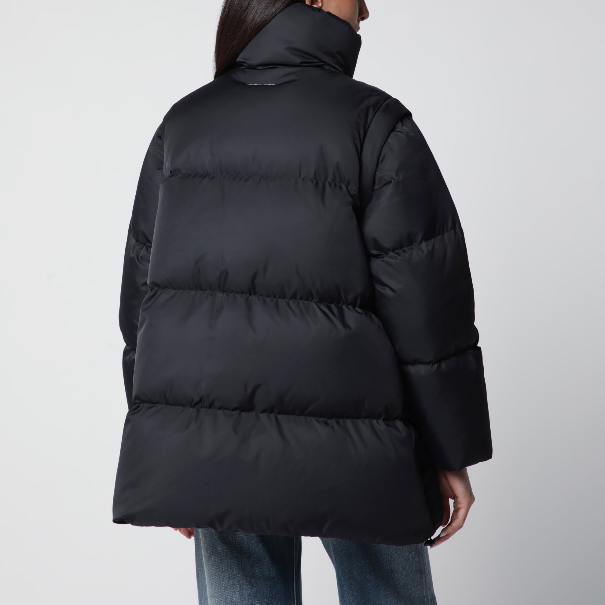 Nylon puffer jacket with detachable sleeves in black