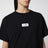 T-shirt nera in jersey di cotone con patch logo