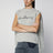 Pull en maille à inscription calligraphiée gris chiné