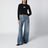 Distressed wide-leg denim jeans in medium blue