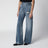 Distressed wide-leg denim jeans in medium blue