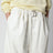 White cotton and silk cropped belted trousers
