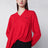 Maglia con drappeggio in lana merino rossa