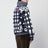 Pull zippé en laine bleu marine et blanche
