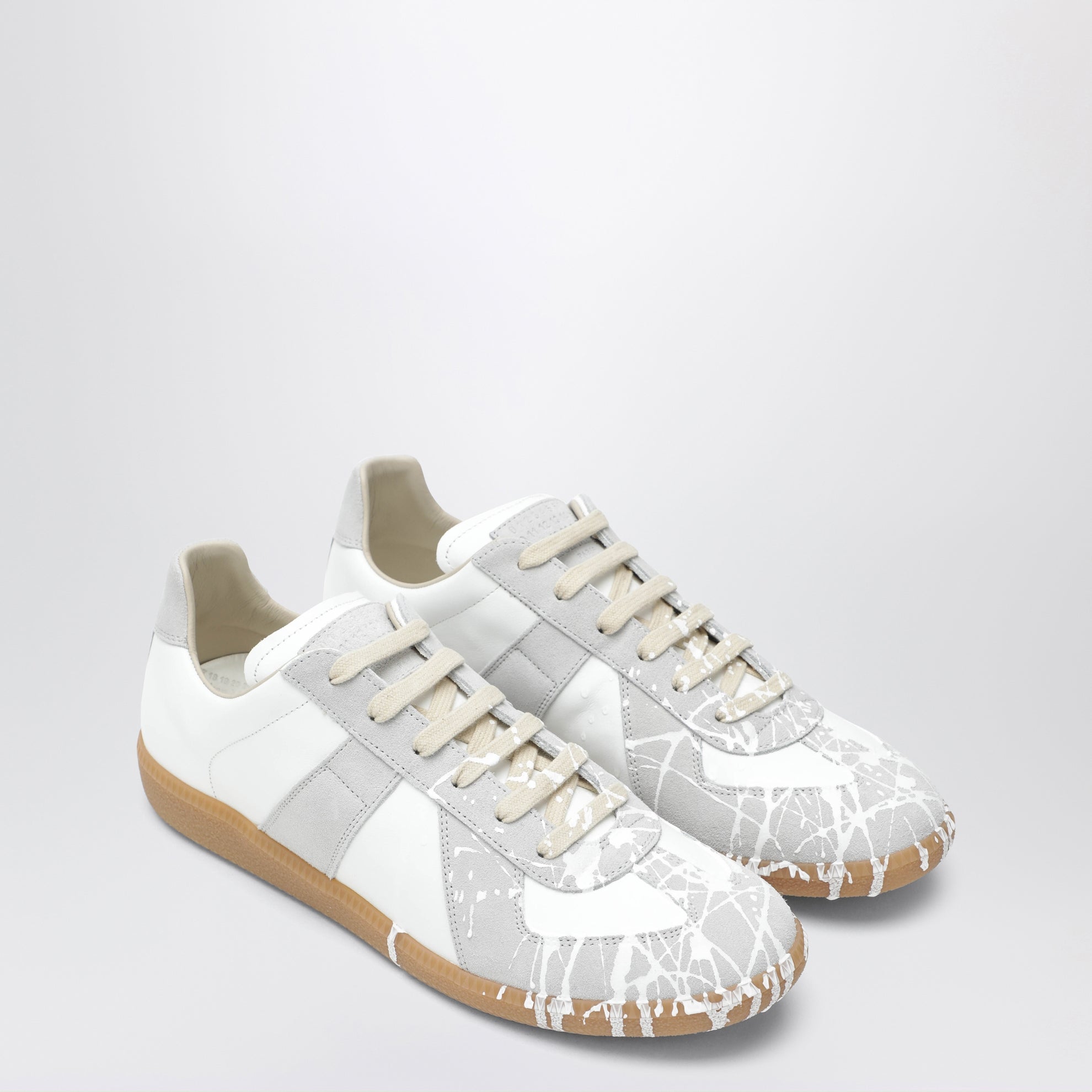 Replica sneakers in White leather and suede