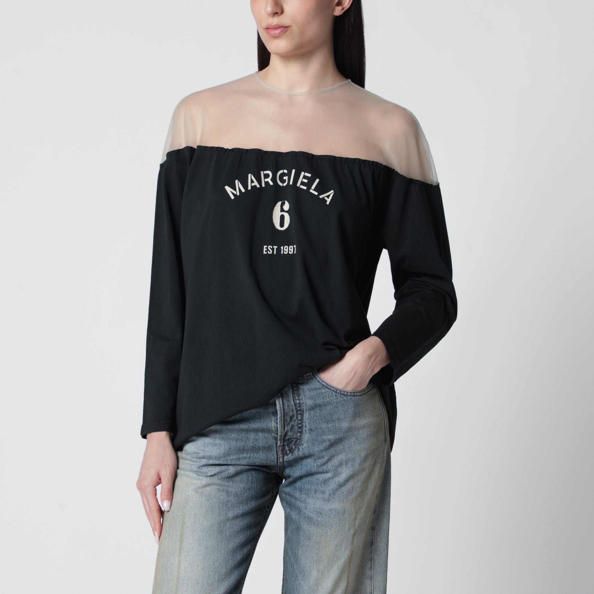 Black top with logo print and sheer insert