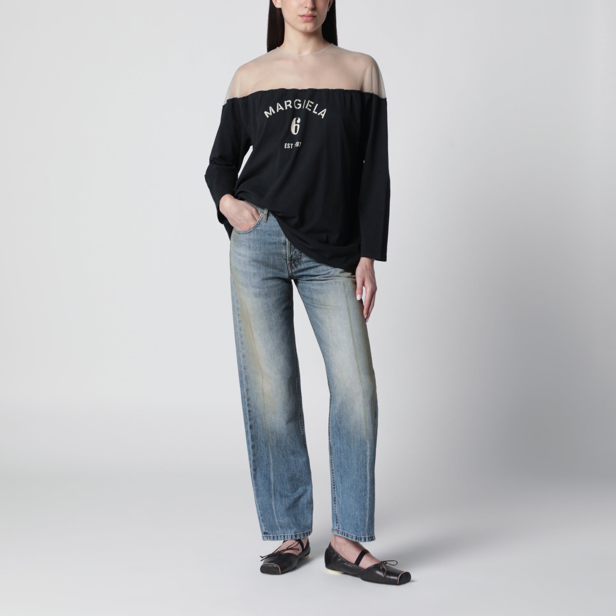 Black top with logo print and sheer insert