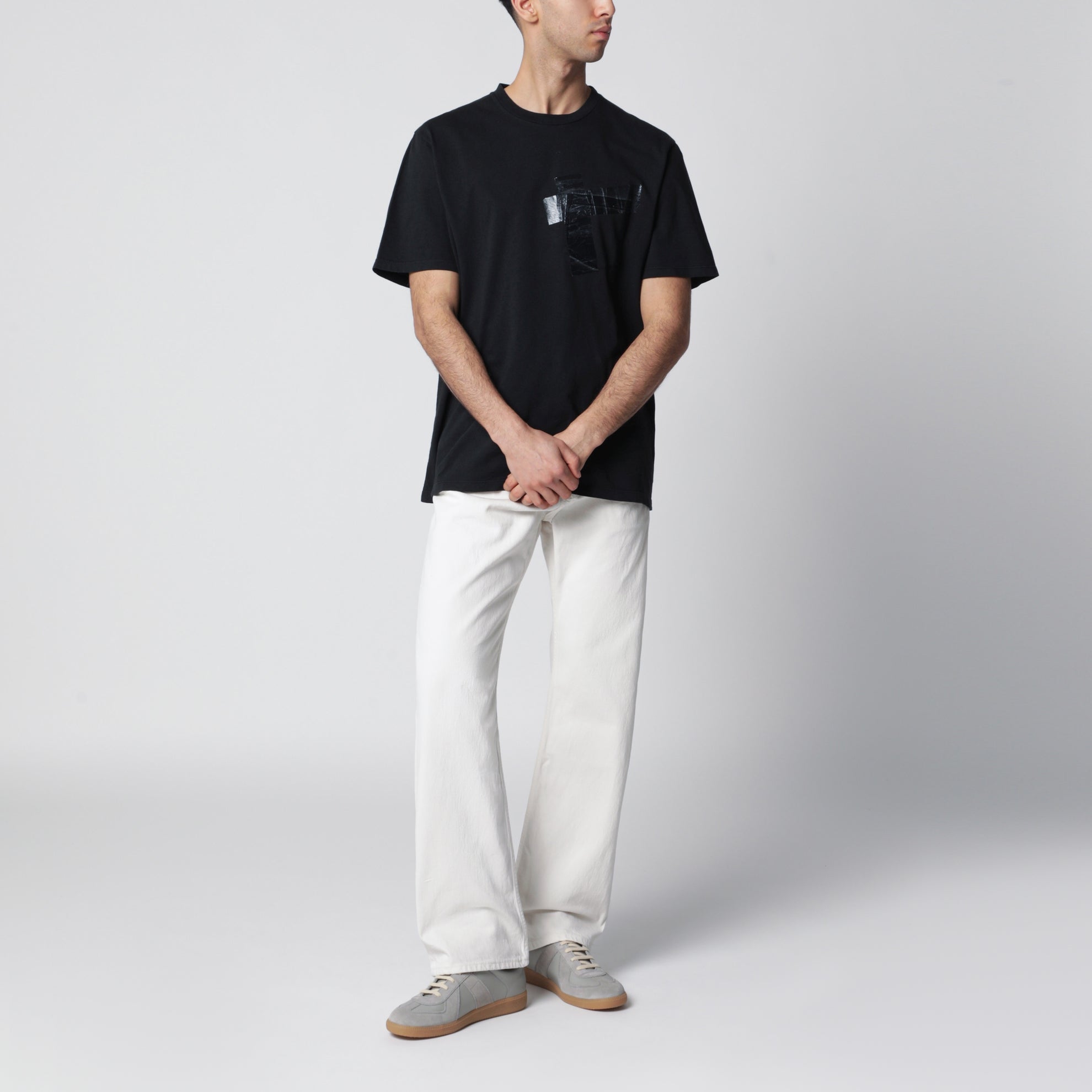 T-shirt en jersey de coton noir à poche rubanée