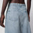 Low-crotch denim bermuda shorts in ice blue
