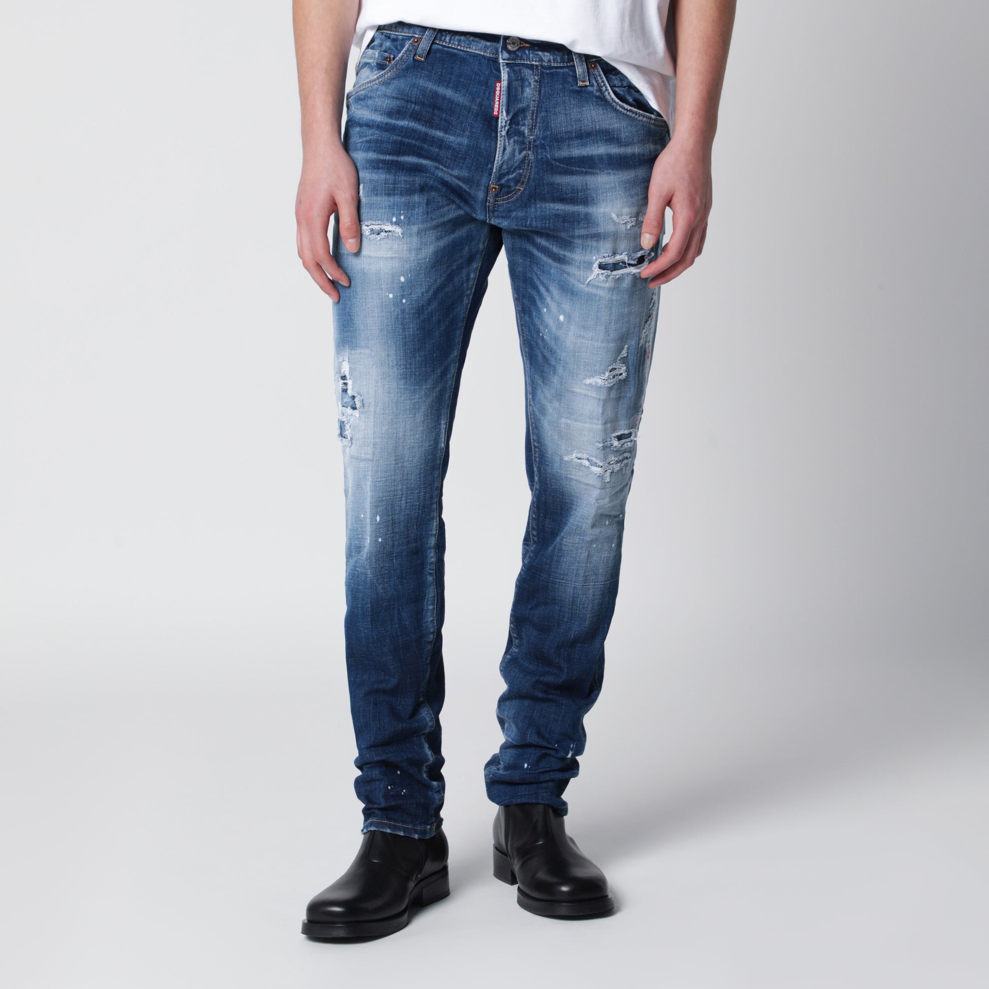 Jeans slim blu slavato con strappi