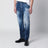 Jeans slim blu slavato con strappi