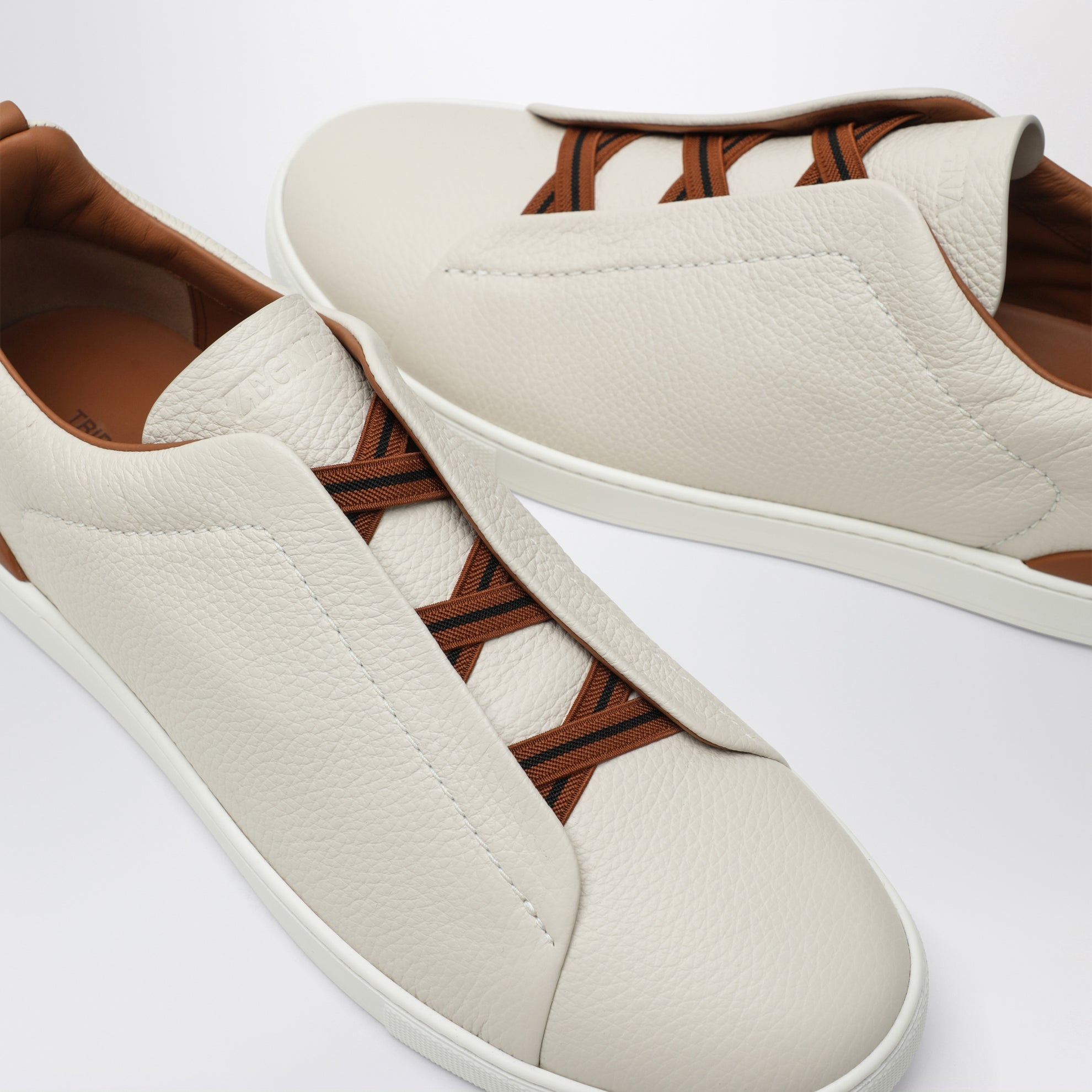 Sneaker Triple Stitch™ bianche in pelle