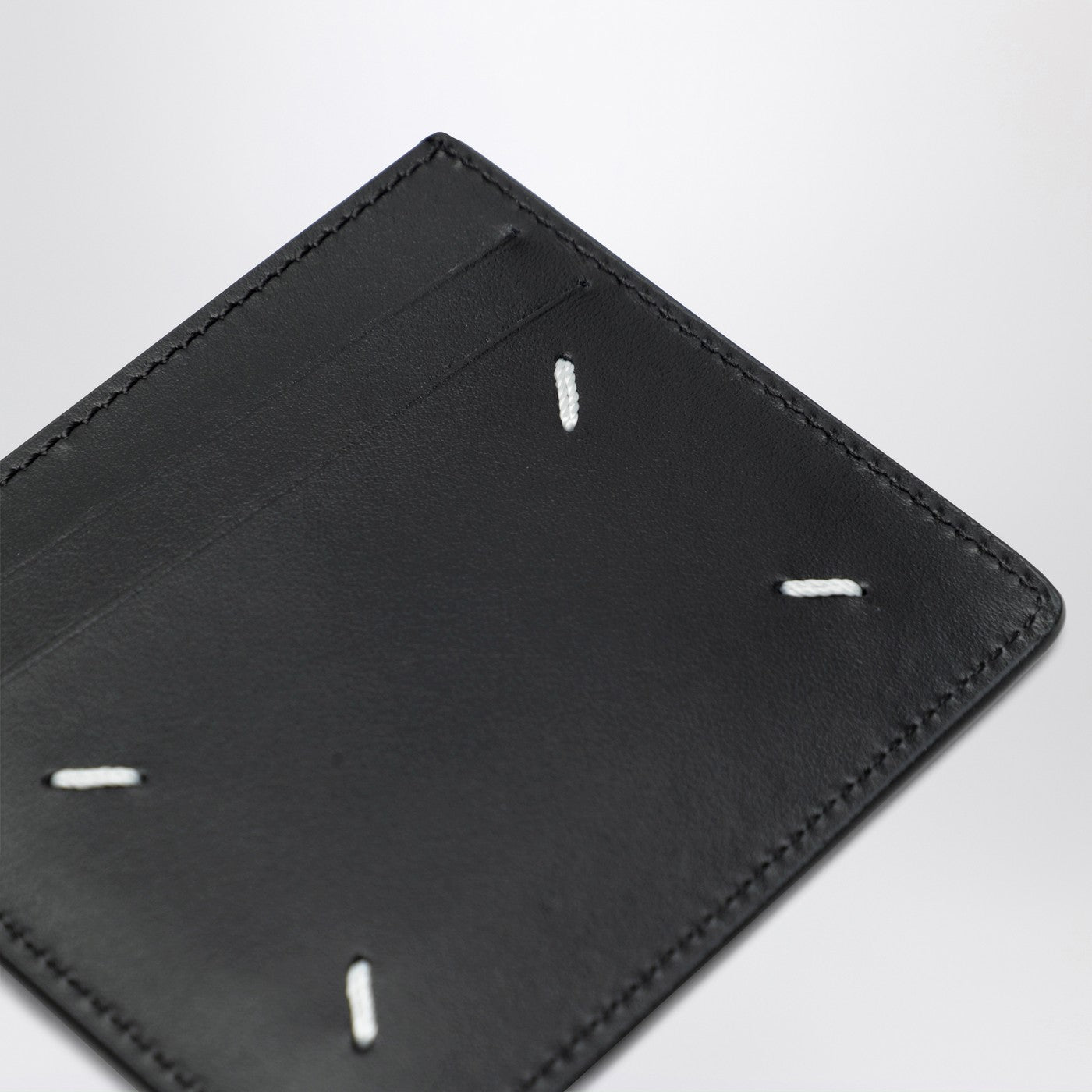 Four Stitches black card holder