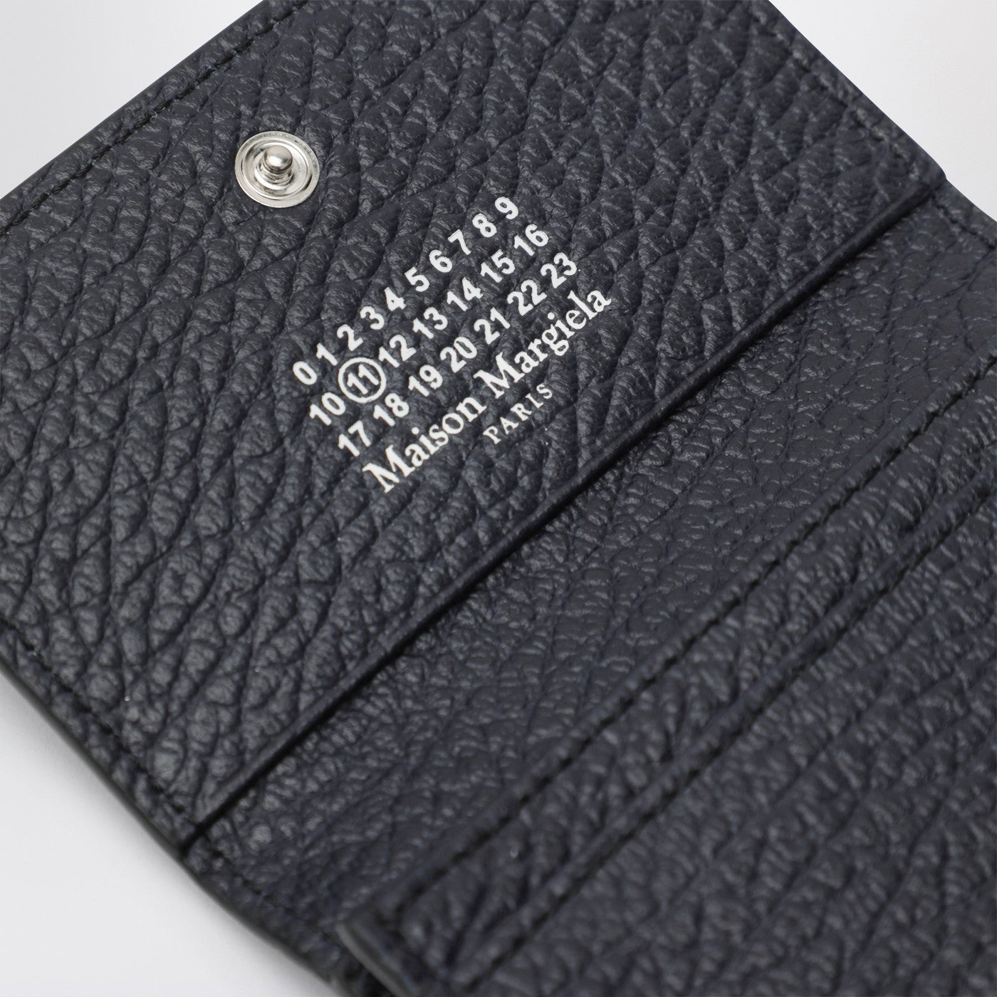 Vier Stiche graue Kartenhalter