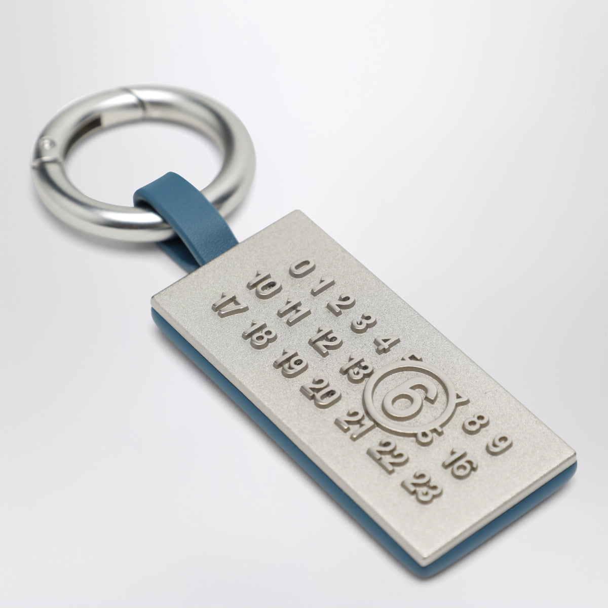 Charm Numeric petrolio in ottone e pelle