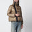 Piumino con zip asimmetrica beige