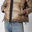 Beige down jacket with asymmetrical zip