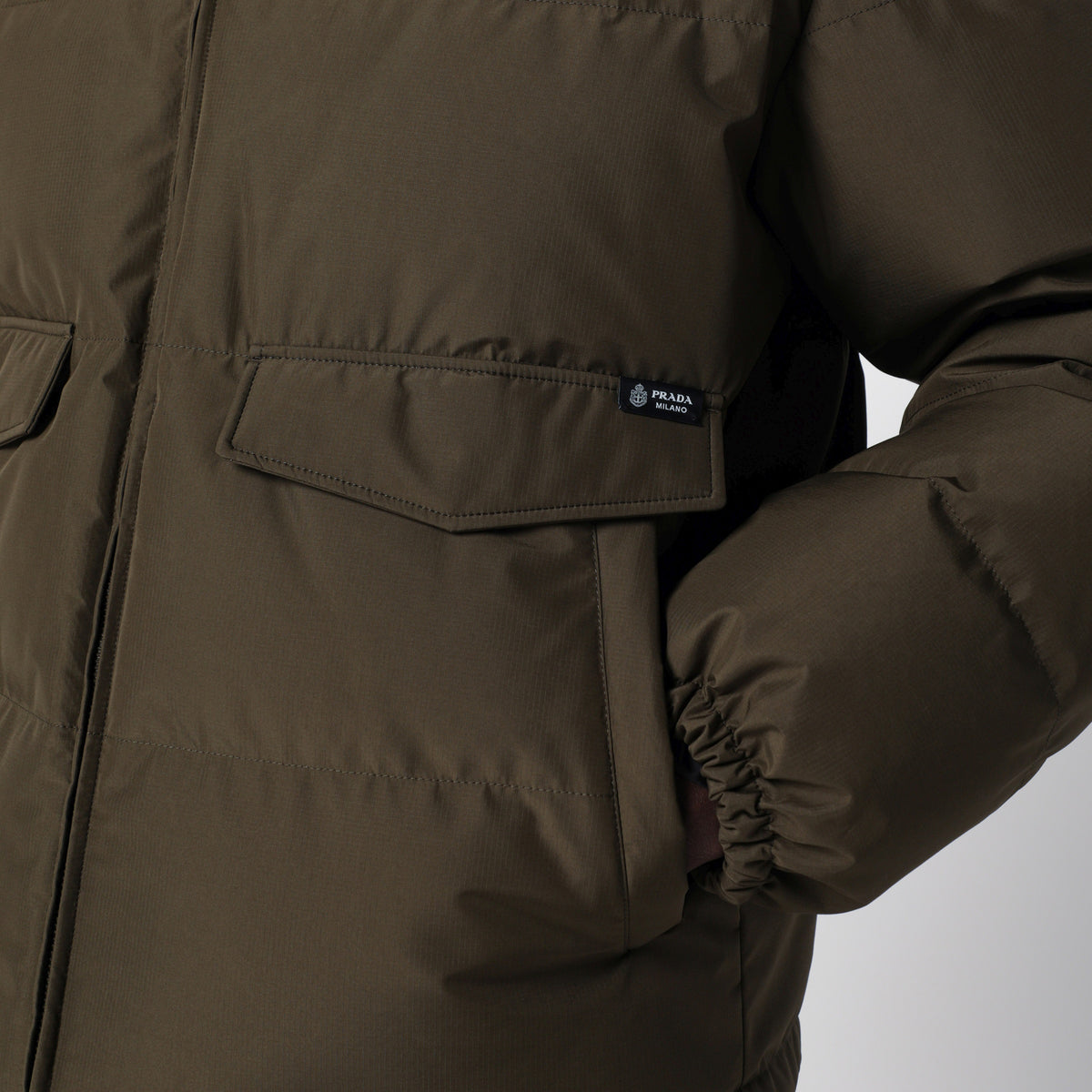 Forest green medium down jacket in technical fabric