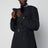 Black double-breasted cotton-blend trench coat