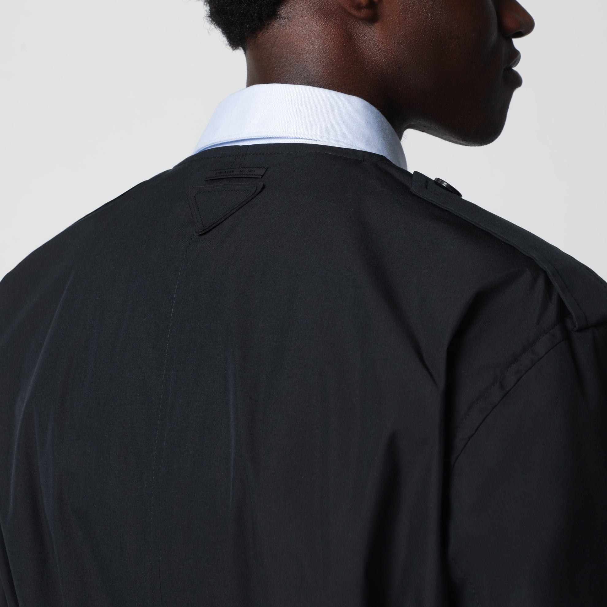 Black double-breasted cotton-blend trench coat
