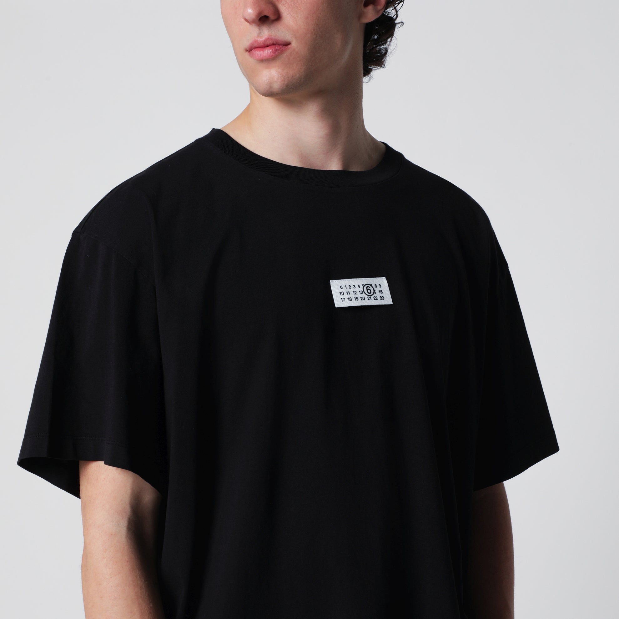 Schwarzes Baumwoll-T-Shirt mit Numeric-Logo