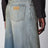 Mid-blue washed-effect denim jeans