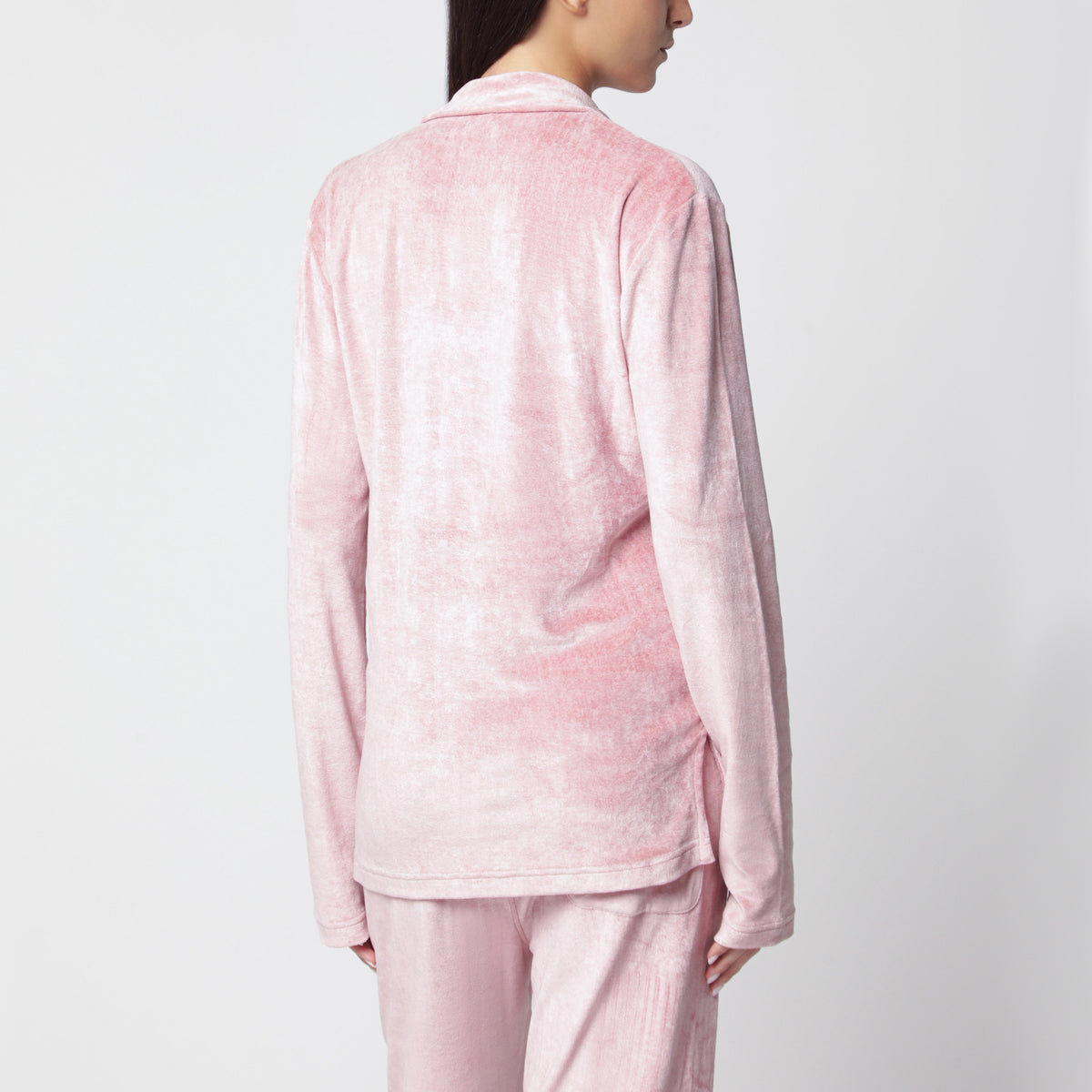 Polo rosa in velluto con scollo a V