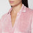 Polo rosa in velluto con scollo a V