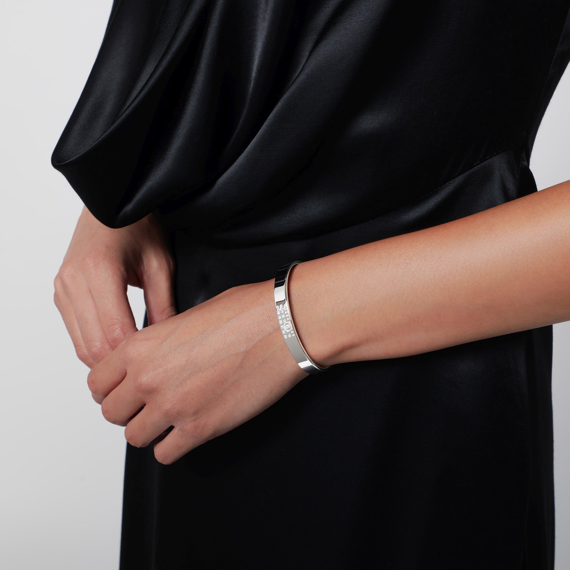 Numeric Logo rigid bracelet in silver-tone metal