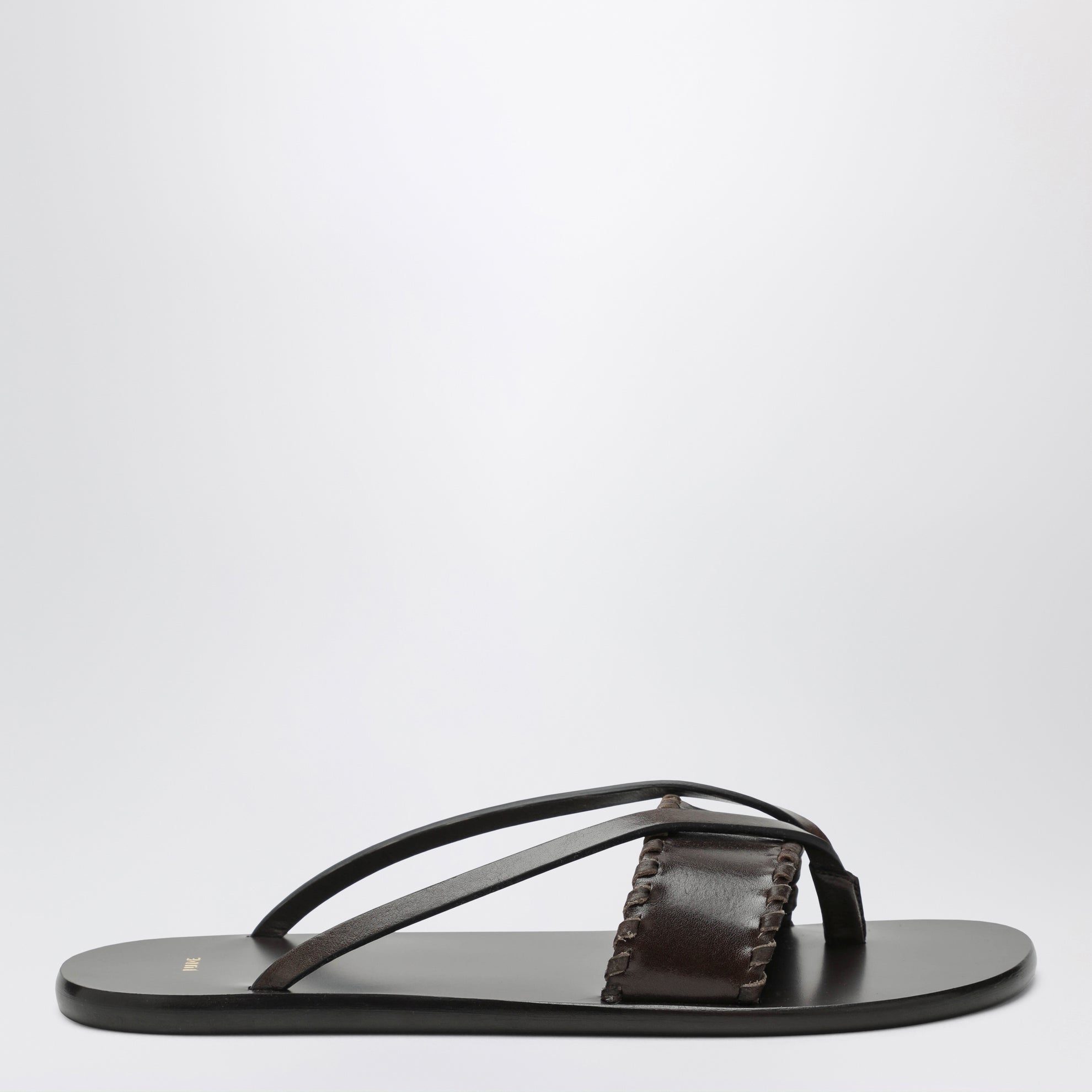 Brown leather flip-flop sandals