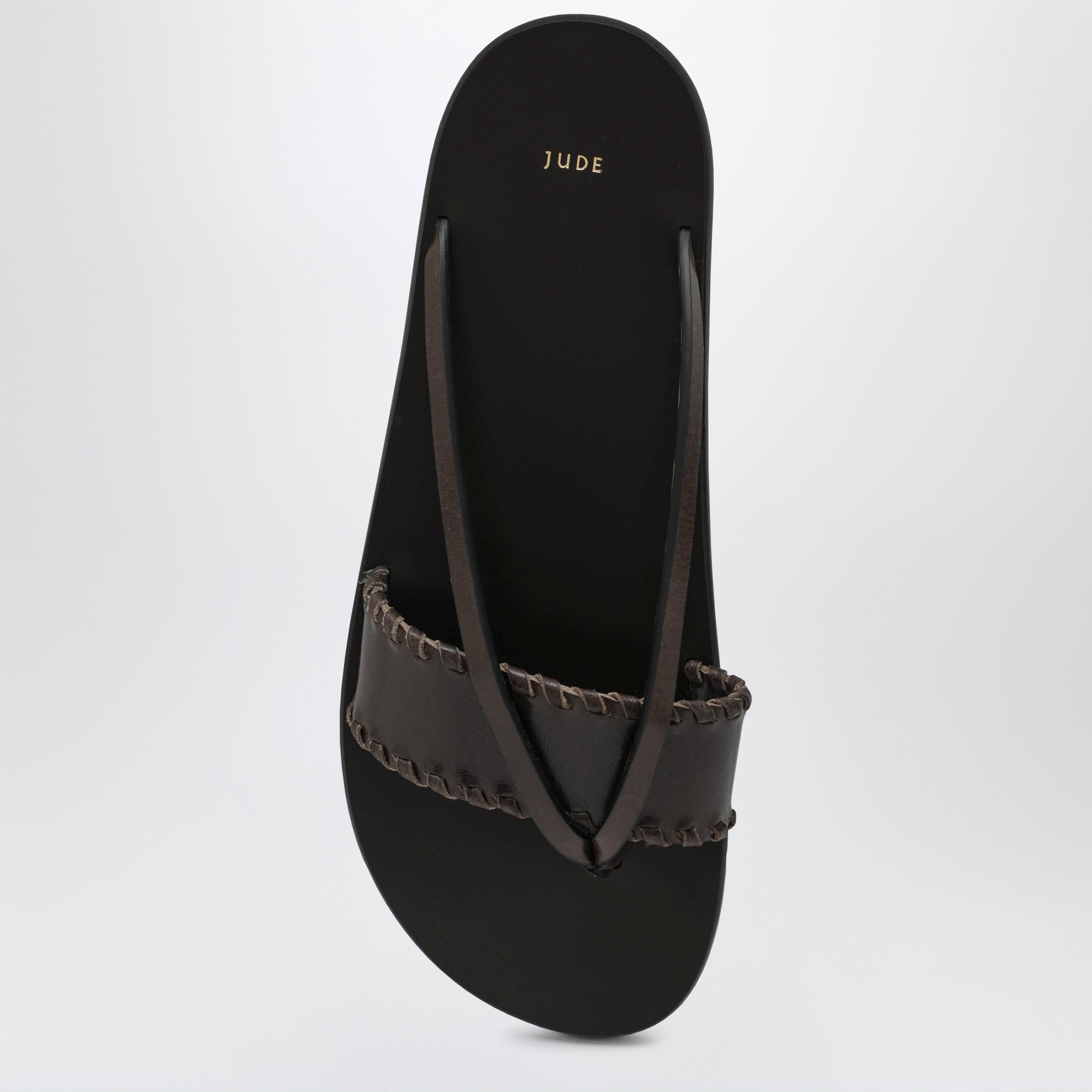 Brown leather flip-flop sandals