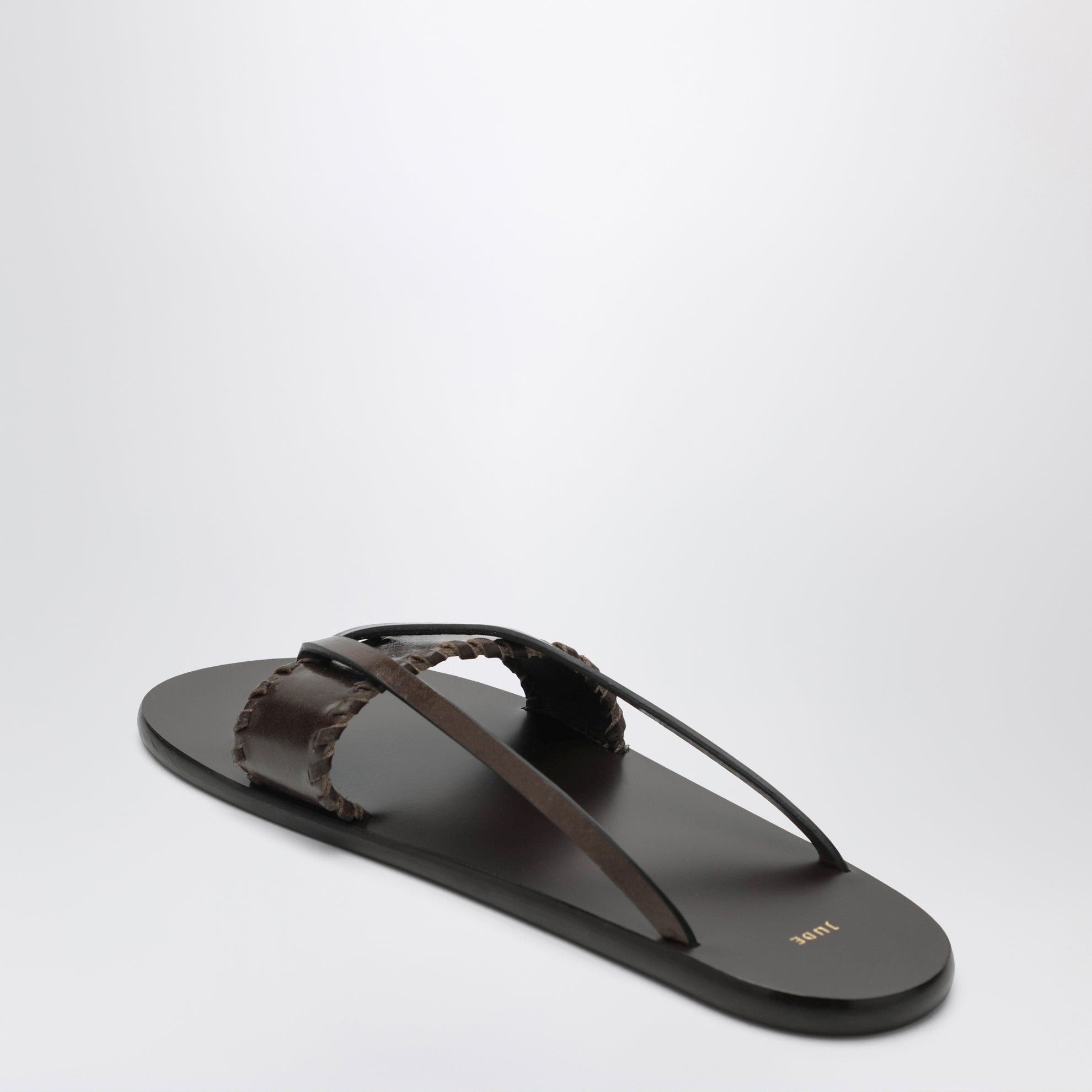 Brown leather flip-flop sandals