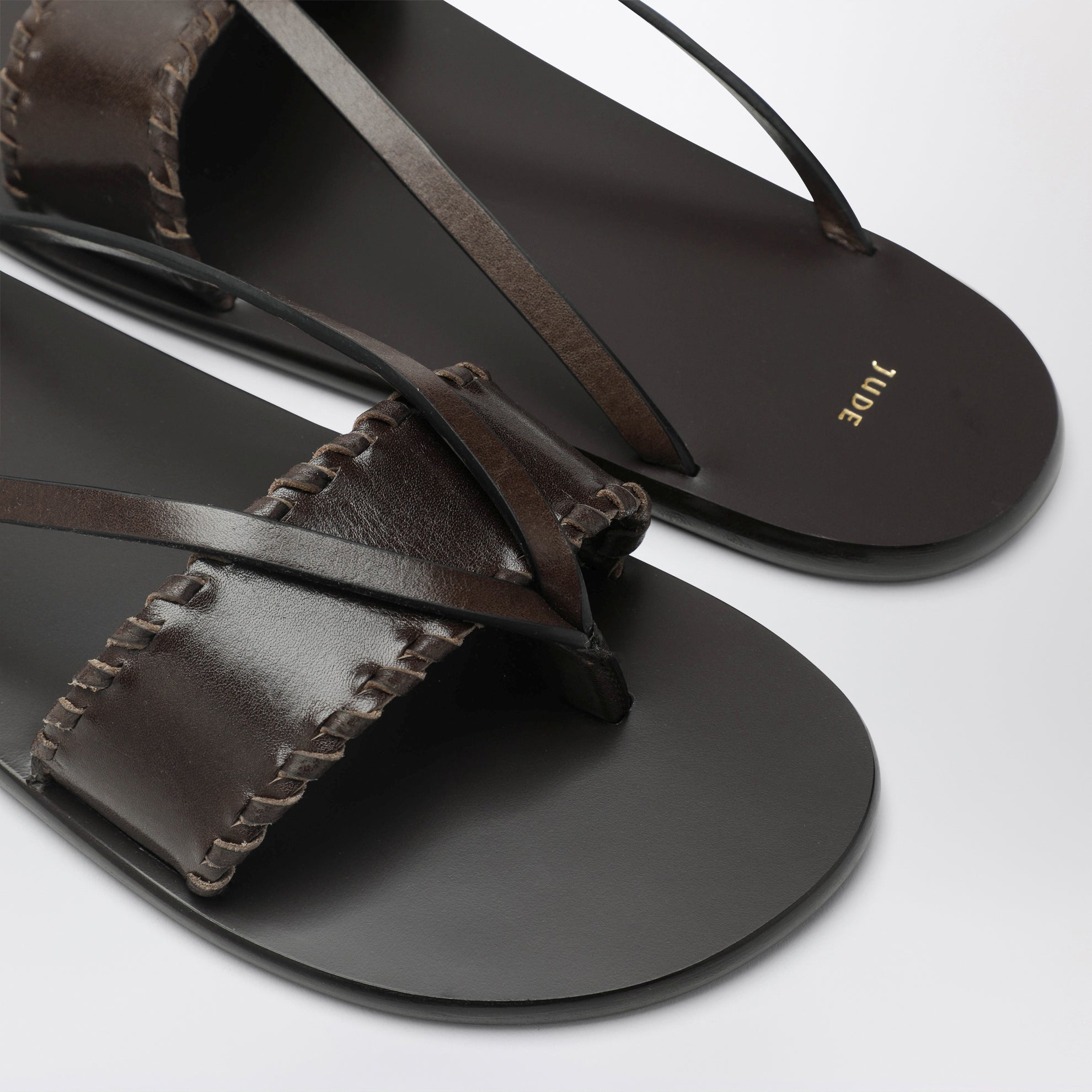 Brown leather flip-flop sandals