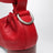Rote Pumps mit D-Ring-Logo