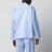 Light blue pajama shirt with white stripes