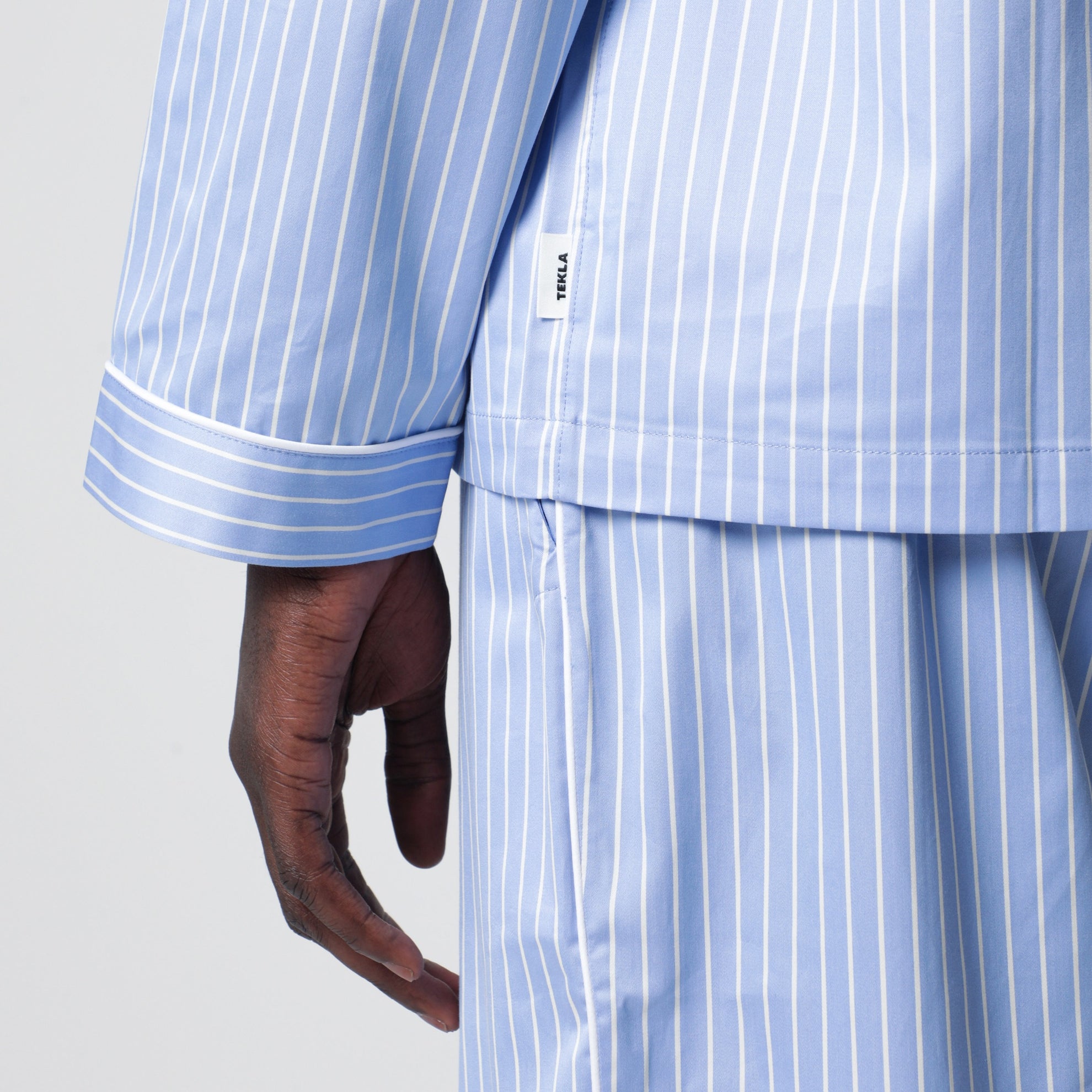 Light blue pajama shirt with white stripes