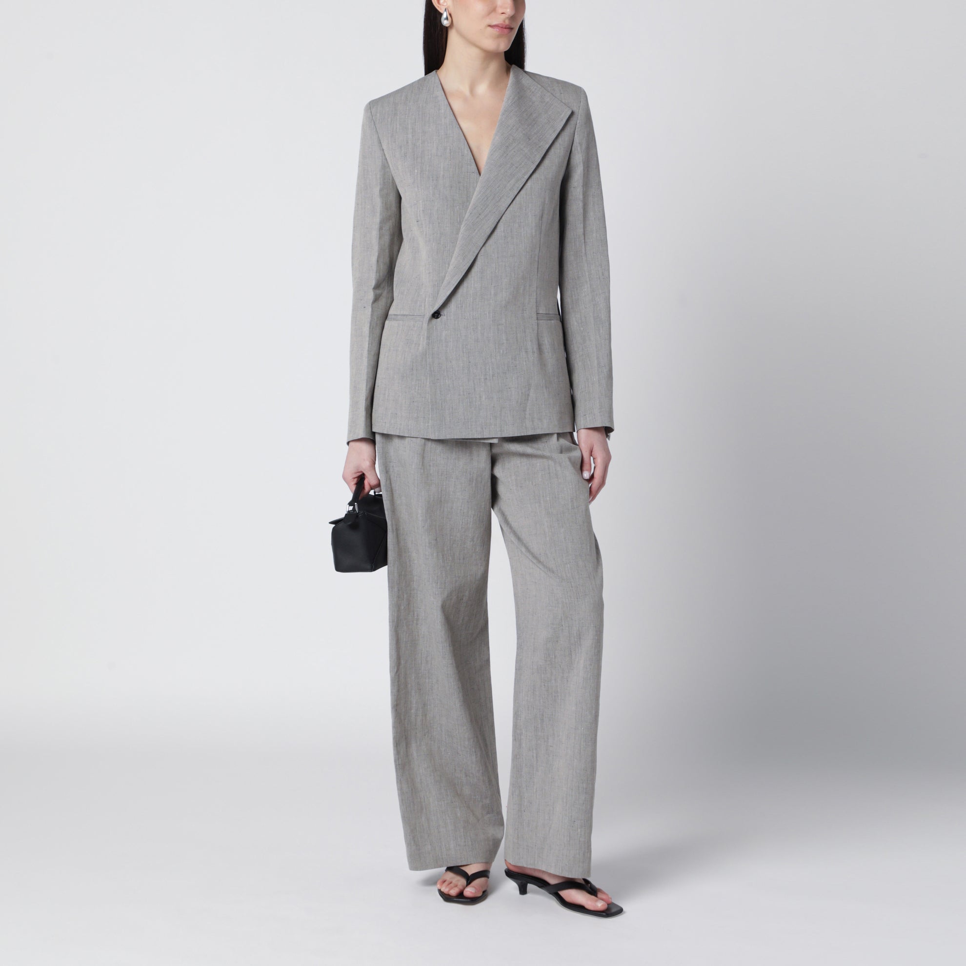 Suna tailored jacket with an asymmetric opening and lapel
