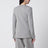 Suna tailored jacket with an asymmetric opening and lapel