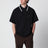 Black piqué polo shirt with embroidered butterfly