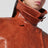 Veste ceinturée couleur cuir en simili-cuir