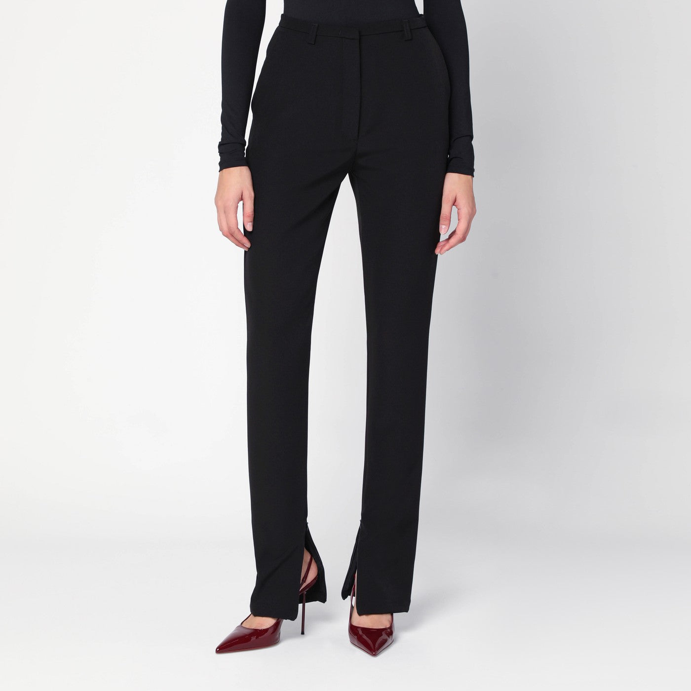 Black trousers with zipped slits