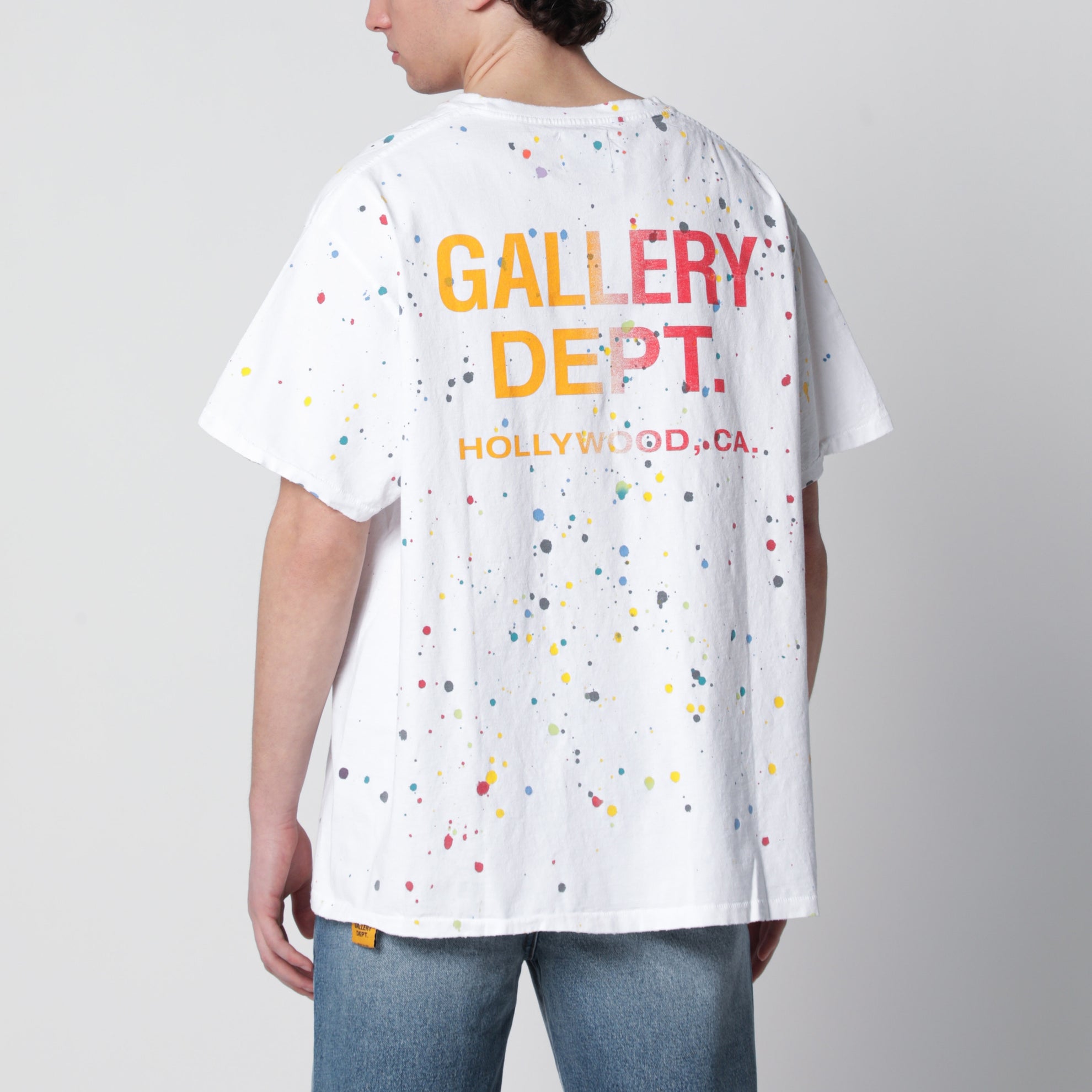 T-shirt bianca con stampa logo e shizzi