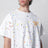T-shirt bianca con stampa logo e shizzi