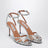 Tequila Sandalen in Silber aus Metallic-Leder mit Kristallen