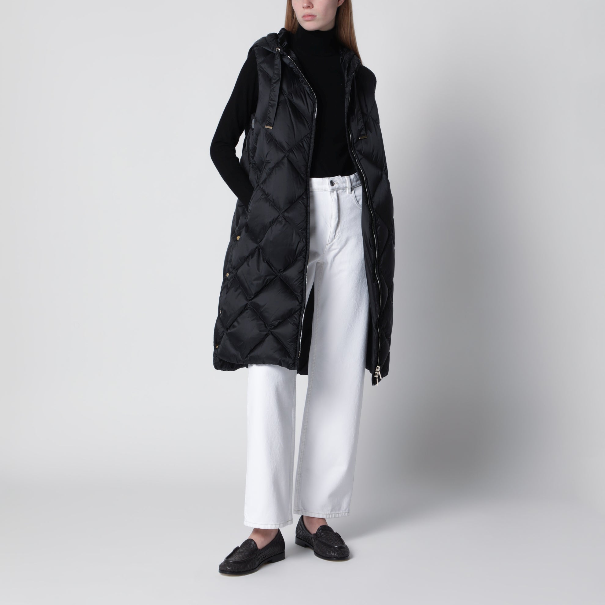Black belted sleeveless down jacket