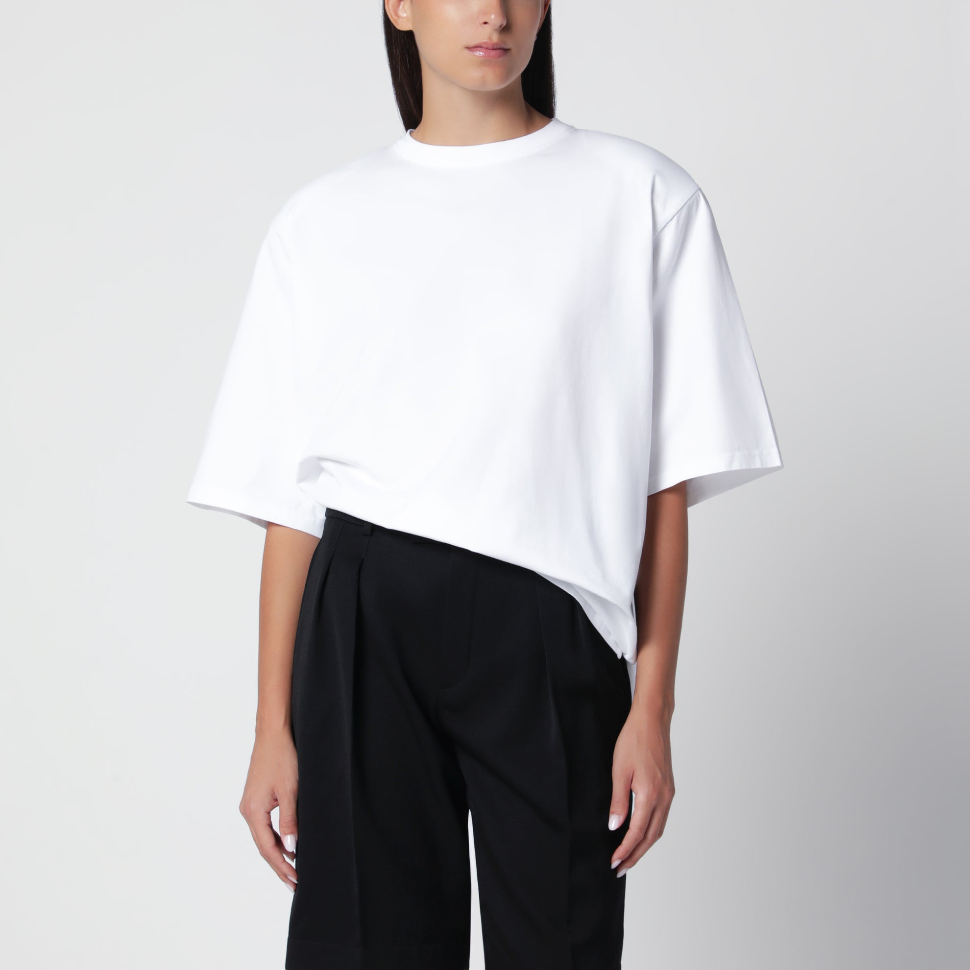 White oversized T-shirt with structured shoulders